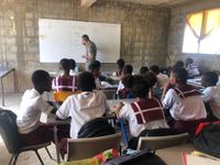 Roman Urban teach the students at Teiman Wisdom Academy